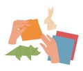 Origami making process. Hands with colored paper animal figurines. Creative workshop for kids